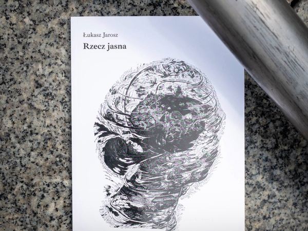 Okładka książki "Rzecz jasna" Łukasza Jarosza